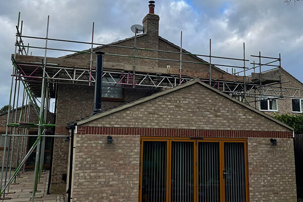 Scaffolding over a conservatory